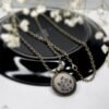 GREYISH BROWN FLORAL PENDANT